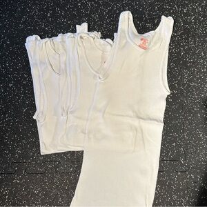 5 white Hanes Wife Beaters